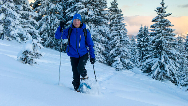Woman doing snowshoeing, Les Gets Holidays, La Marmotte hotel